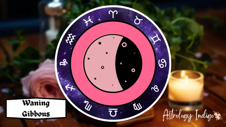 A symbol of a Waning Gibbous Moon is surrounded by the Zodiac signs on a table with flowers and candles