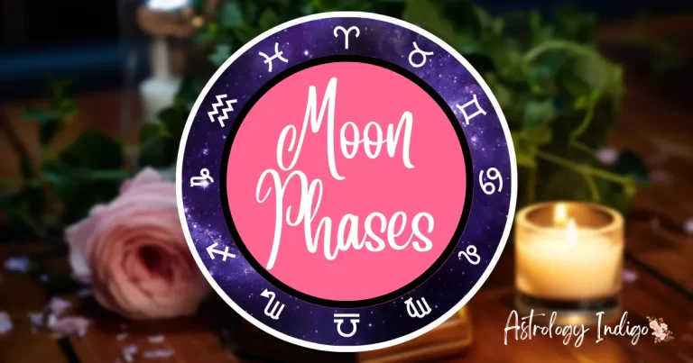 An image of the Zodiac signs in a circle around the words Moon Phases sits in front of a desk with flowers and candles